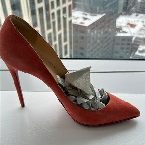 Burnt orange Christian Louboutin red bottom pointed toe stiletto heels